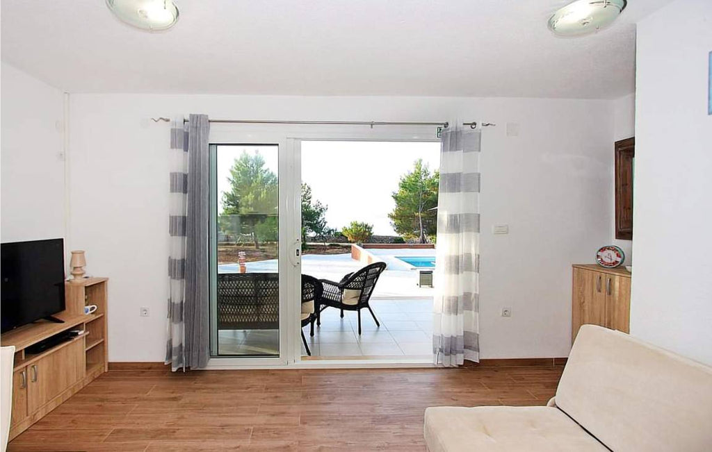 Ferienhaus mit Terrasse, privatem Pool und Grill | Bergblick